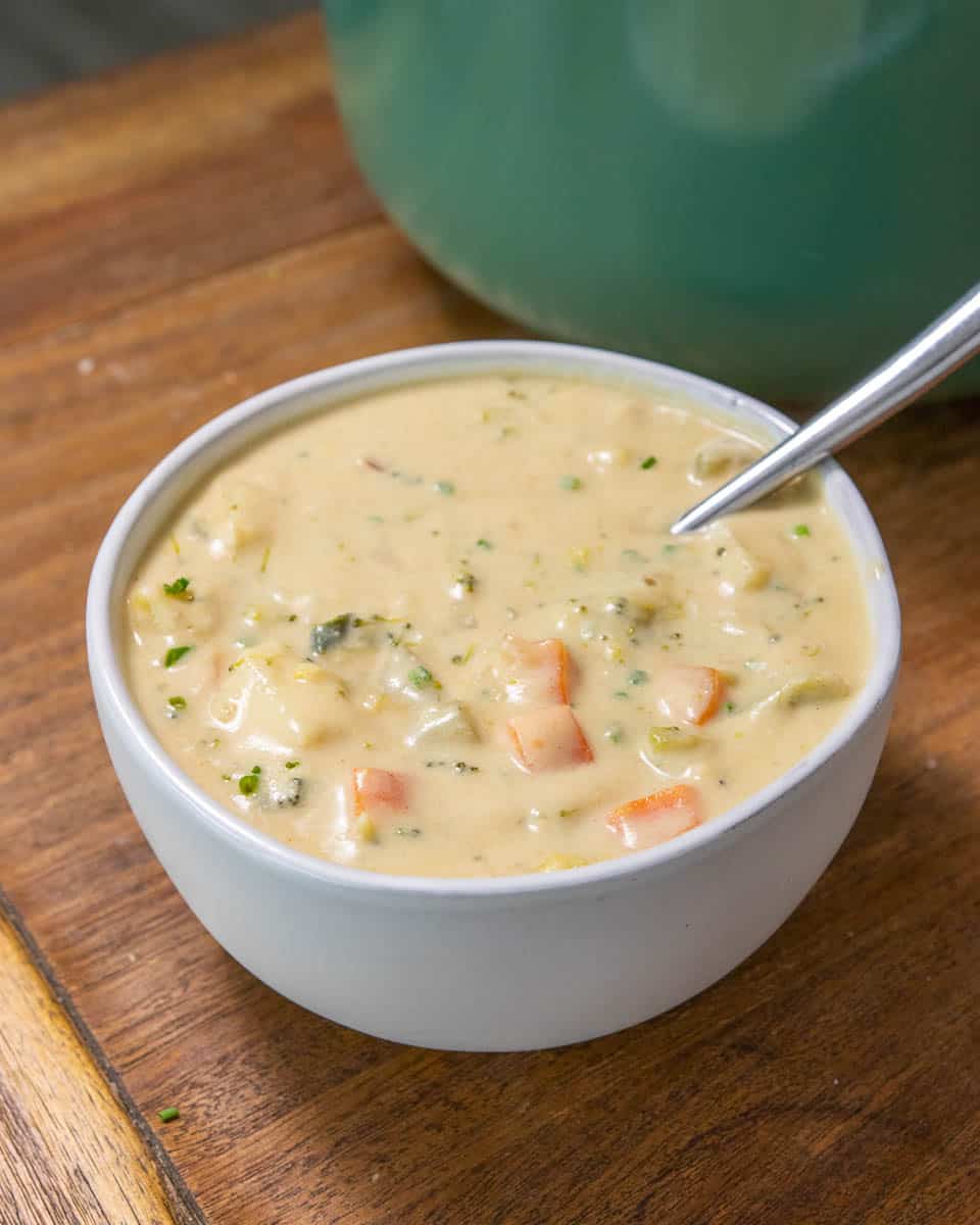bowl of vegan broccoli cheddar soup