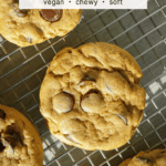 an overhead of vegan pumpkin chocolate chip cookies on a cooling rack