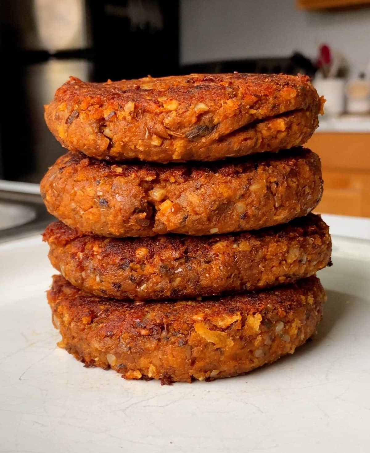 a stack of four lentil burgers