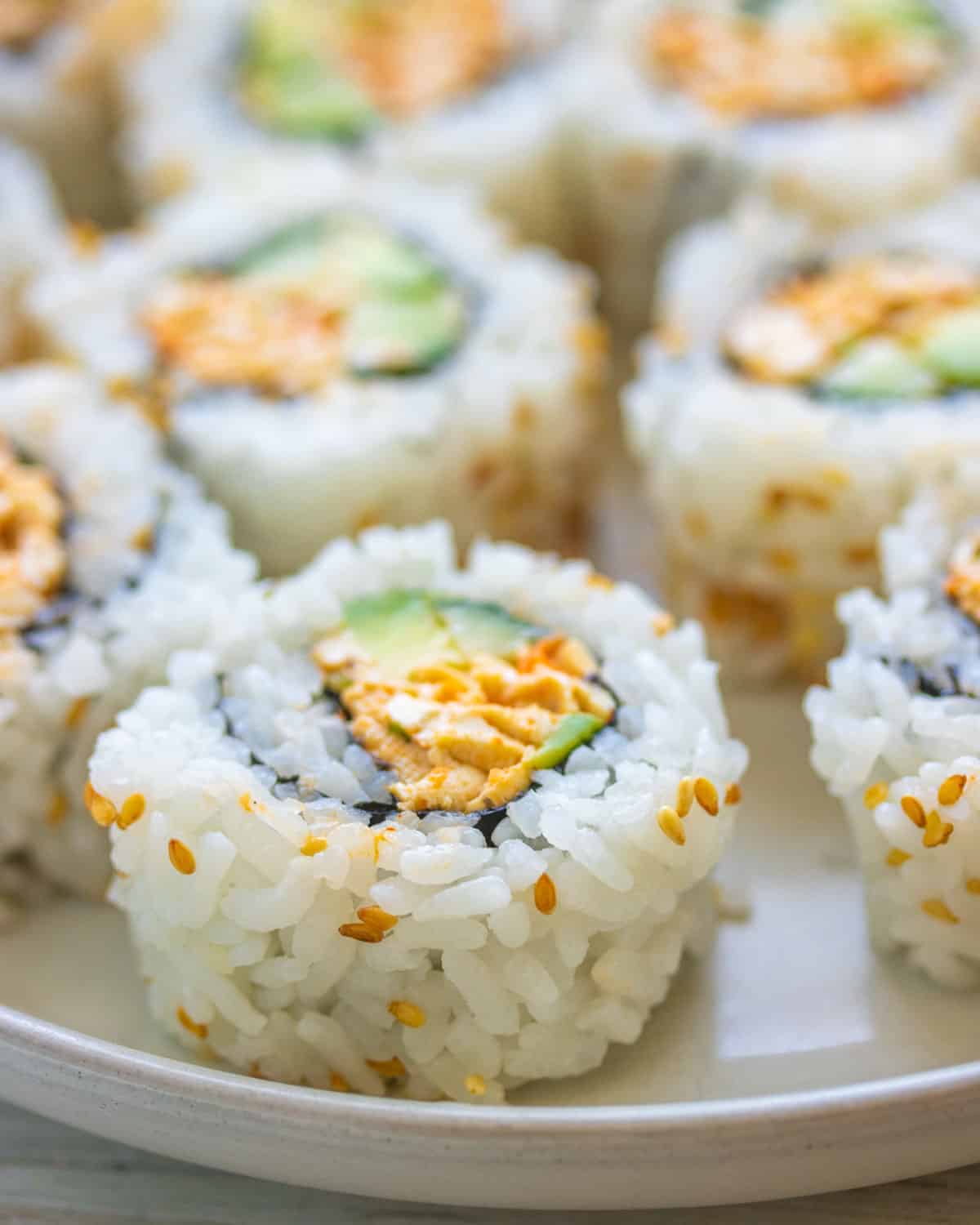 Another closeup shot of a vegan California roll, to show the cross section of ingredients.